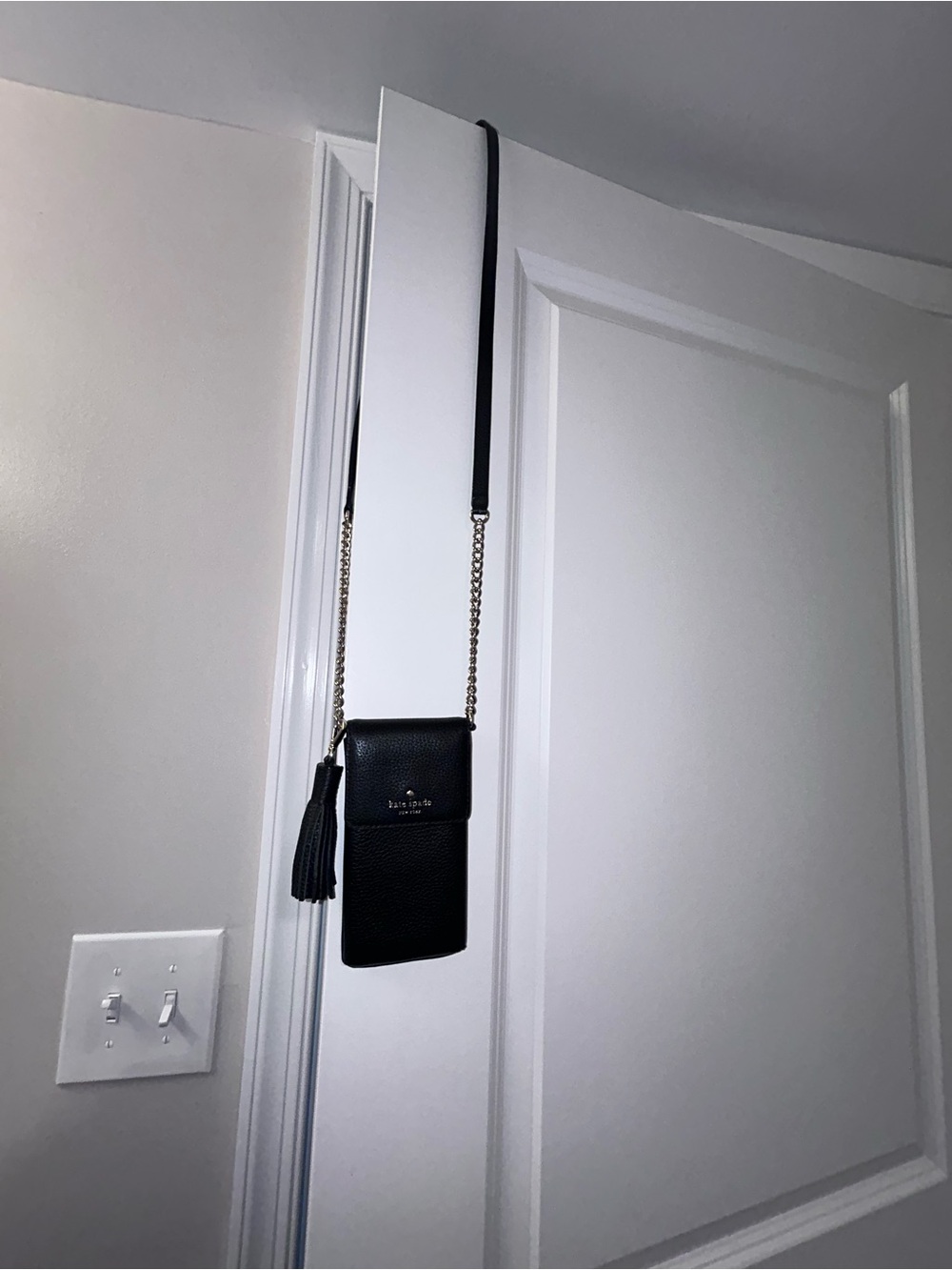 kate spade Black Pebbled Leather Tassel Crossbody Phone Pouch